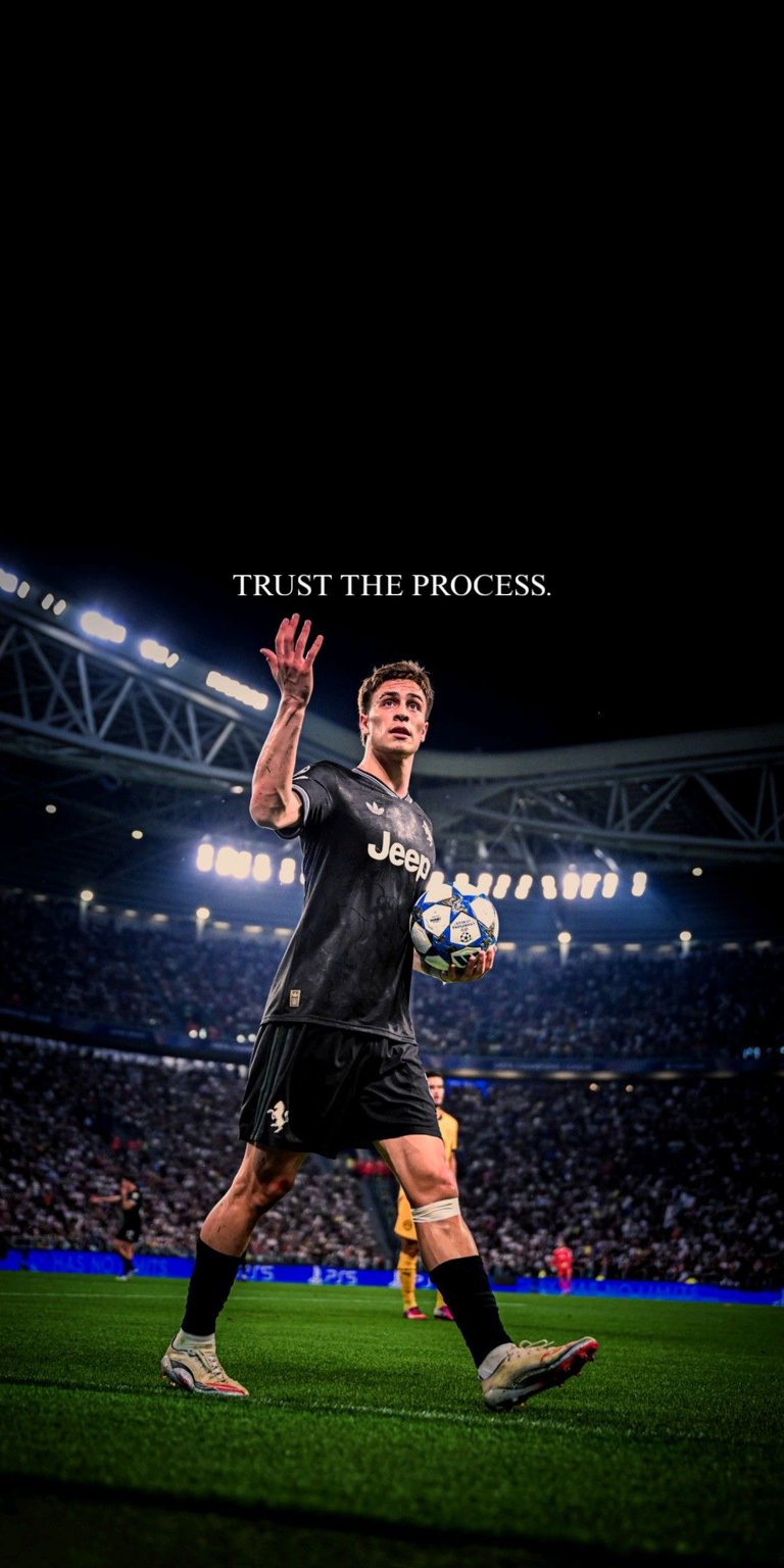 Kenan Yildiz 4K wallpaper designed for OLED / AMOLED wallpapers, featuring deep black negative space and bright stadium lighting. This wallpaper is optimized for iPhone, showcasing a dark kit, sharp subject depth, and a calm yet confident match-day mood.