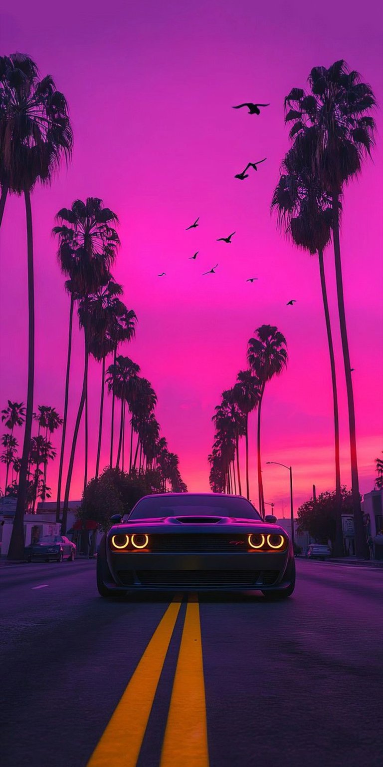 Dive into the retro-futuristic vibes with this Dodge Challenger cruising down a palm-tree-lined highway. Featuring a vibrant purple and pink "Cotton Candy" sunset sky with silhouettes of birds and palm trees, this wallpaper perfectly captures the Synthwave/Vaporwave aesthetic. The glowing orange headlights of the Challenger add a fierce touch to the nostalgic atmosphere.