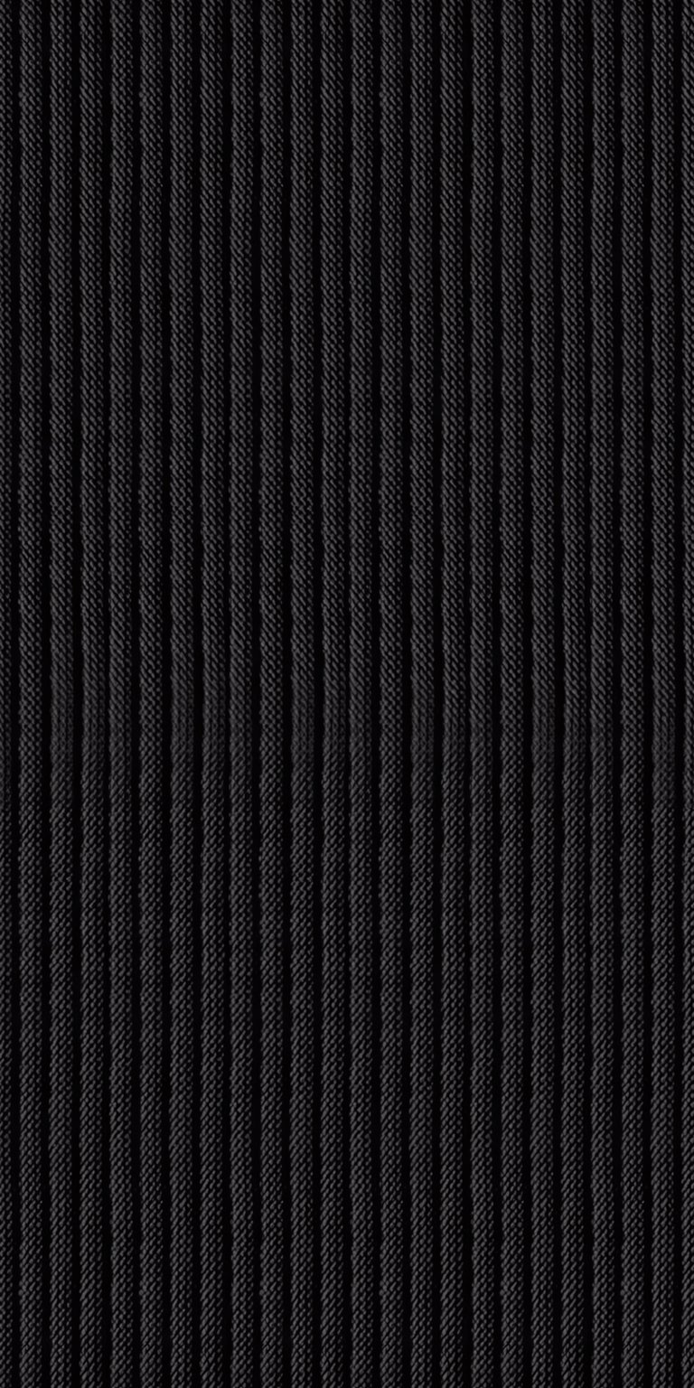 A minimalist yet dynamic wallpaper featuring a classic, all-black, corduroy-like ribbed texture with spatial effects that make the clock appear layered. Perfect for a sleek, dark mode aesthetic and users who prefer a clean, sophisticated, and professional look. Works beautifully on iPhone, Android, and AMOLED displays.