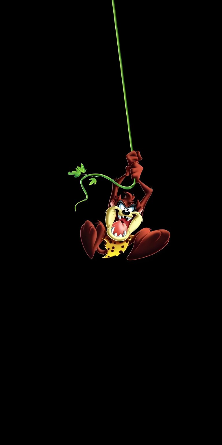 Spice up your iPhone with this vibrant Taz 4K wallpaper. This striking wallpaper captures Taz mid-swing, clinging to a bright green vine, complete with a spotted yellow bib.