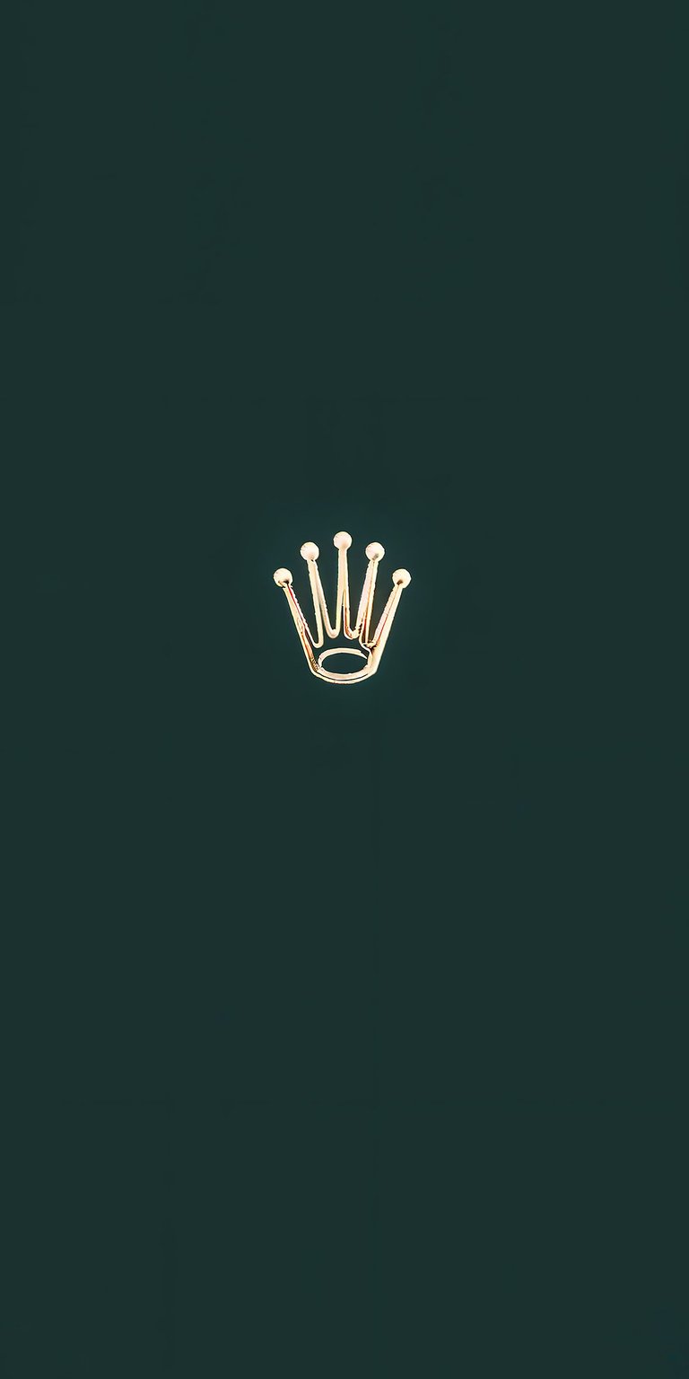 Rolex Crown 4K wallpaper showcasing a minimalist gold crown logo on a deep green background. This aesthetic wallpaper features clean composition and luxury branding, ideal for a refined iPhone lock screen and home screen look.