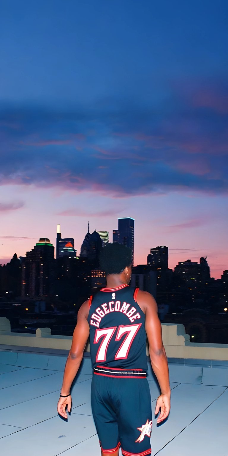 Get this V. J. Edgecombe Jr. wallpaper in stunning 4K resolution for your iPhone! This wallpaper features Edgecombe in his jersey overlooking the city skyline at dusk, with a colorful sky above.
