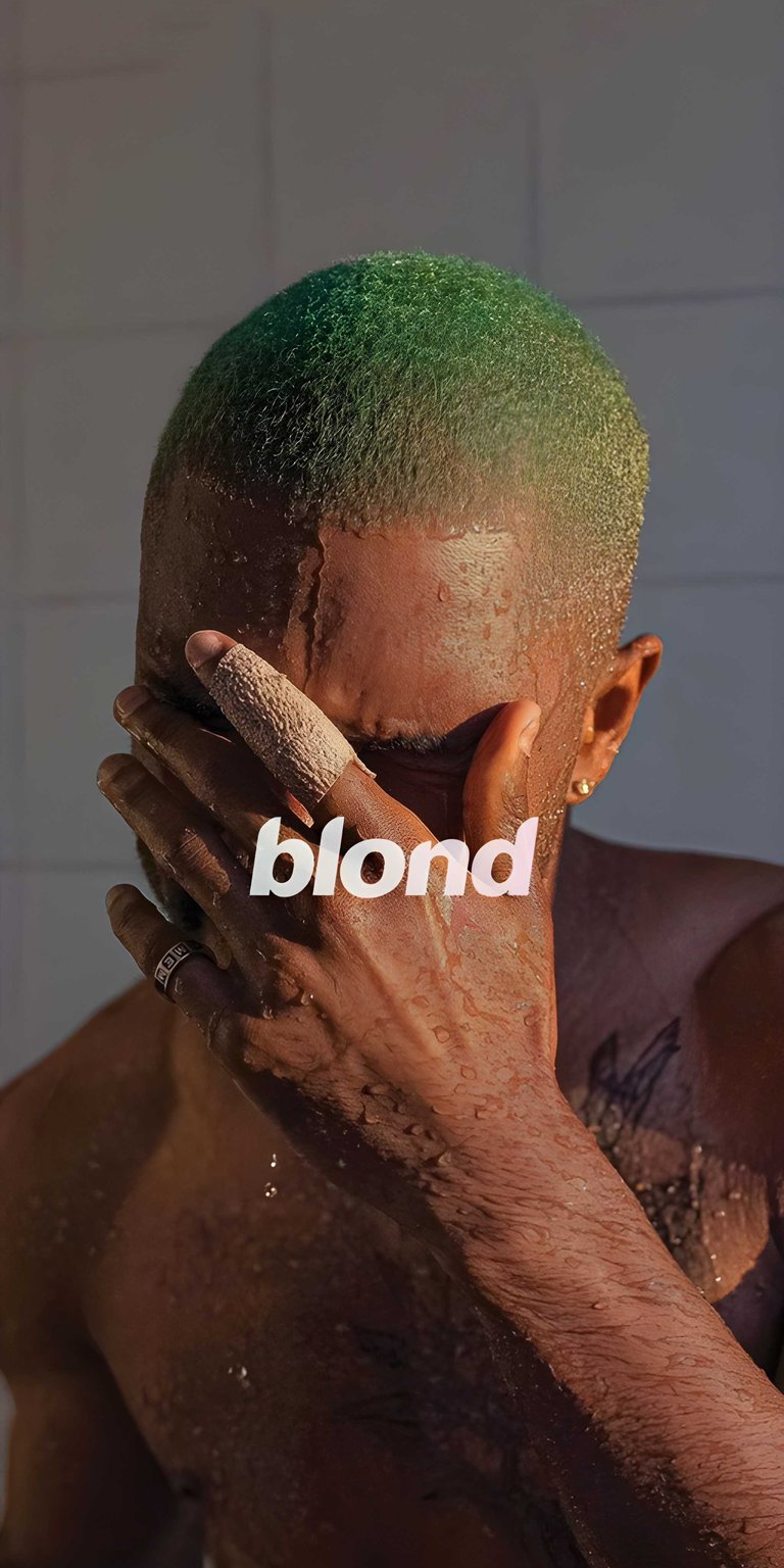 This stunning Frank Ocean wallpaper showcases the artist with unique green hair and water droplets clinging to his skin in 4K resolution, perfect for your iPhone. The 'blond' text and bandaged finger add an intriguing visual detail to this striking wallpaper.
