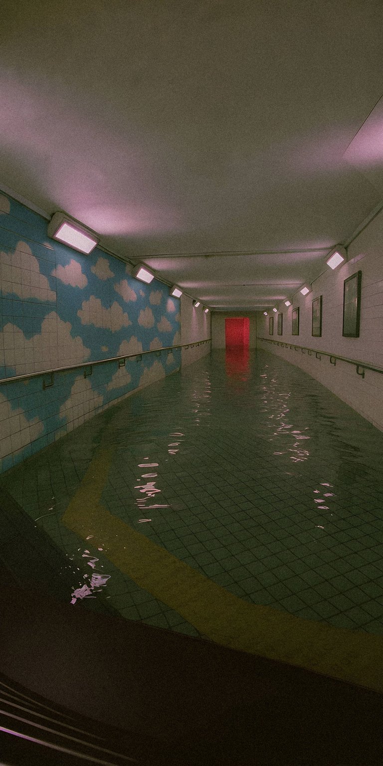 Download this captivating flooded pool wallpaper in stunning 4K for your iPhone, showcasing water-filled tiled hallway with cloud paintings. The scene is accentuated by a bright red doorway at the hall's end.