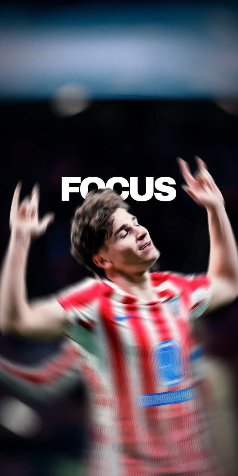This 4K wallpaper features Julián Álvarez in a red and white striped kit, capturing an intense moment of focus on the pitch. Designed for iPhone, this aesthetic wallpaper uses a radial blur effect and high-contrast lighting to create a dynamic sense of depth and energy.