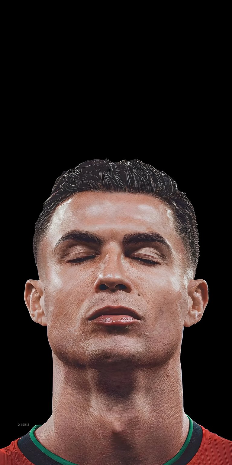 Download this stunning Cristiano Ronaldo 4K wallpaper for your iPhone, showcasing his closed eyes and damp hair. Use this stunning wallpaper to showcase your favorite player.