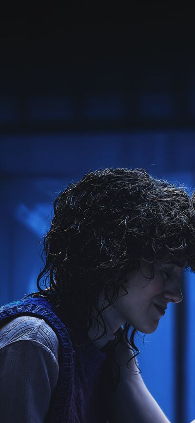 This Will Byers 4K wallpaper is a great way to customize your iPhone. This matching wallpaper for 2 people features Will with his wet hair and a blue sweater, creating a unique wallpaper experience.