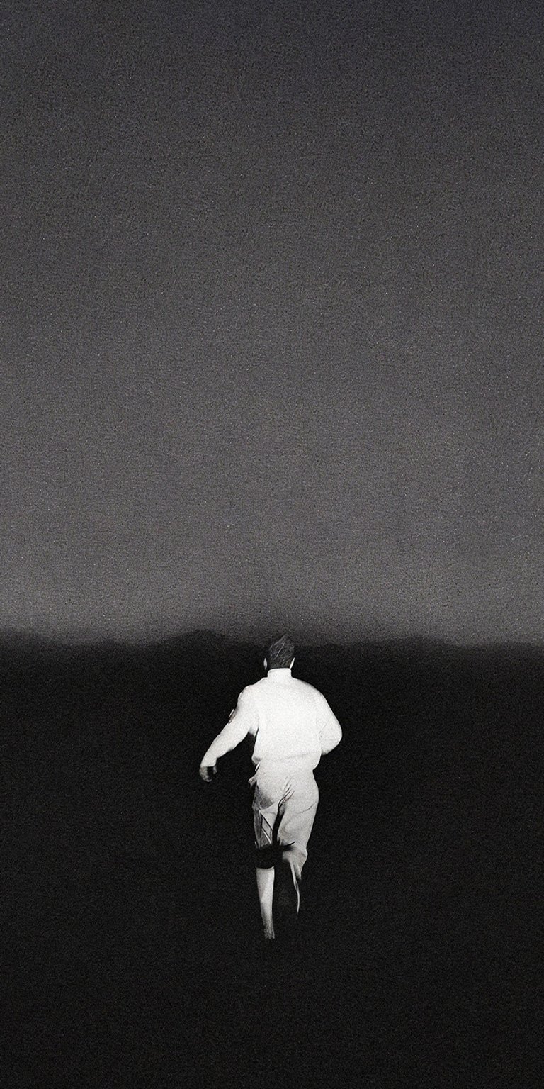 Man running in the dark wallpaper iPhone 4K