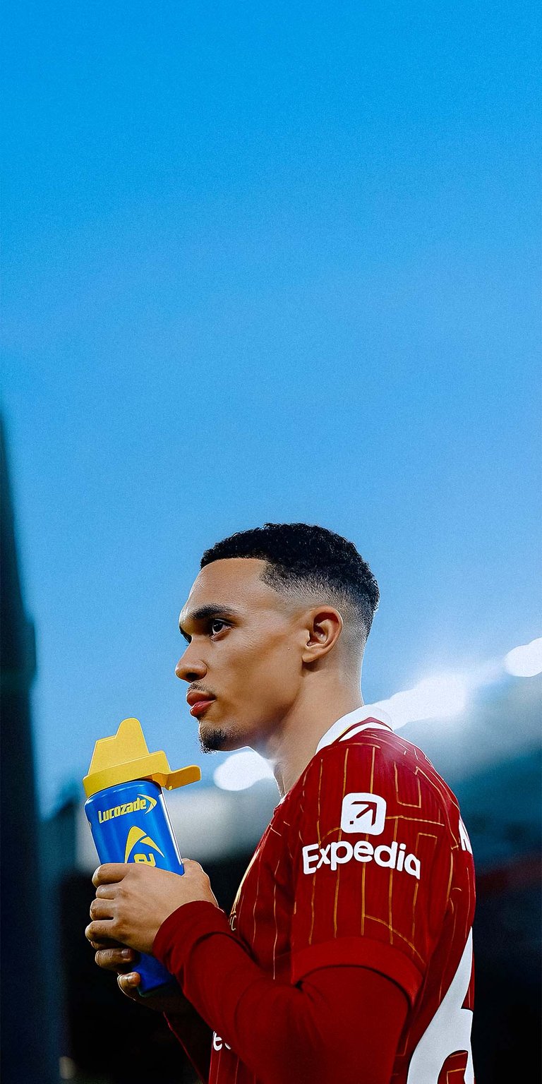 Trent Alexander-Arnold holding a drink wallpaper