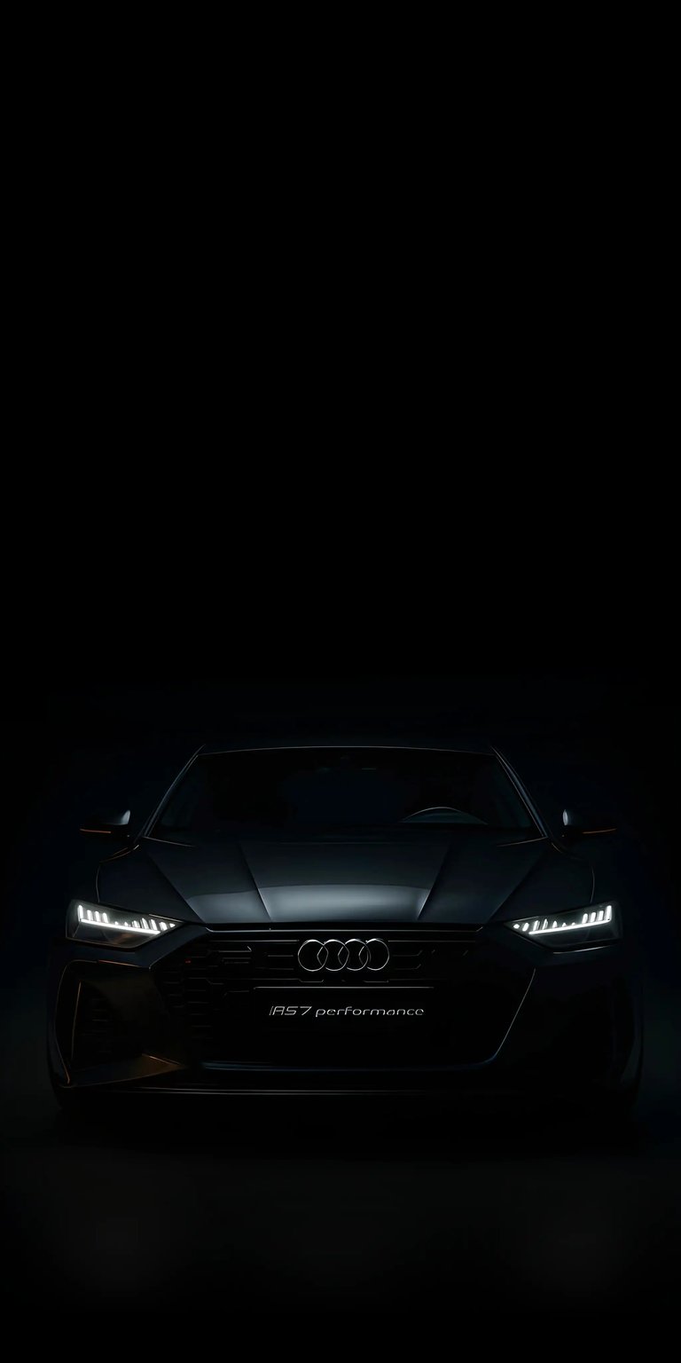 Download this slick Audi RS7 4K wallpaper for your iPhone, highlighting the vehicle's bright headlights and menacing front grille. This high-definition wallpaper will add a touch of sophistication to your mobile device.