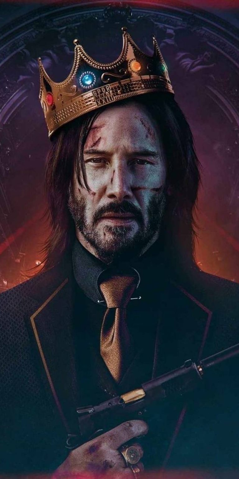 John Wick with crown holding a gun wallpaper 4k