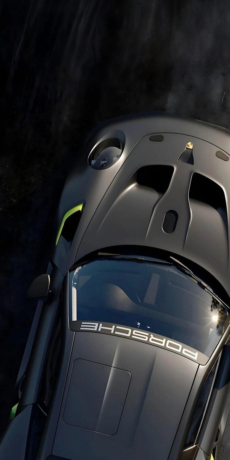 Download this stunning Porsche wallpaper in 4K for your iPhone, showcasing its aggressive hood vents, reflective windshield, and subtle lime green accents. This wallpaper captures the essence of luxury and speed.