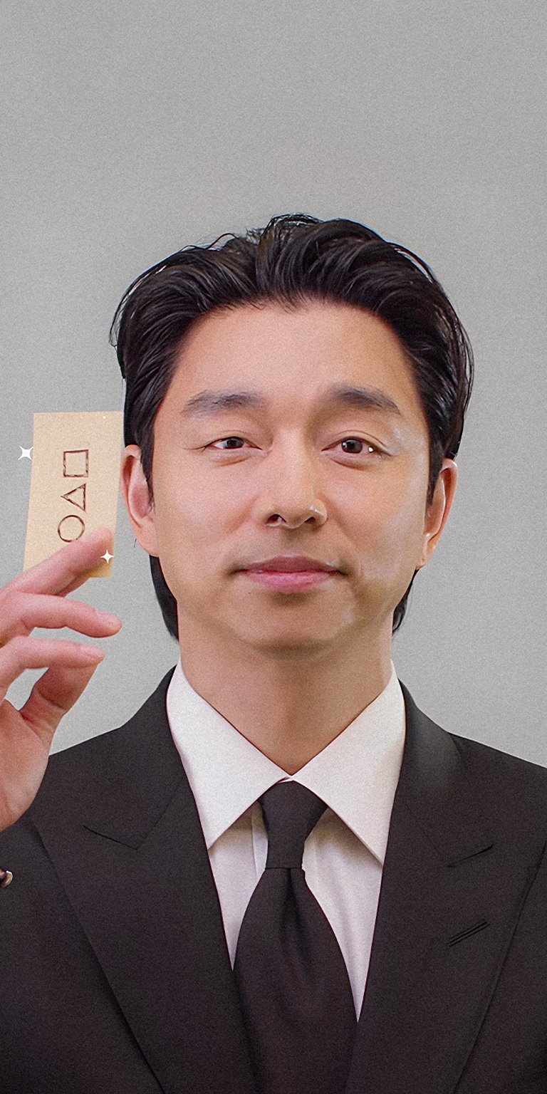 Salesman Guy holding the logo of squid game wallpaper