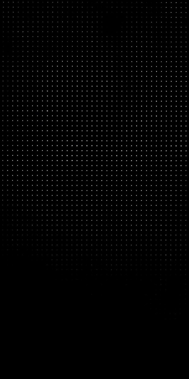 This OLED-friendly black 4K wallpaper features a precision dot grid pattern designed specifically for mobile screens. Enhance your iPhone with a dark minimalist wallpaper that utilizes deep blacks and subtle light textures for battery efficiency.