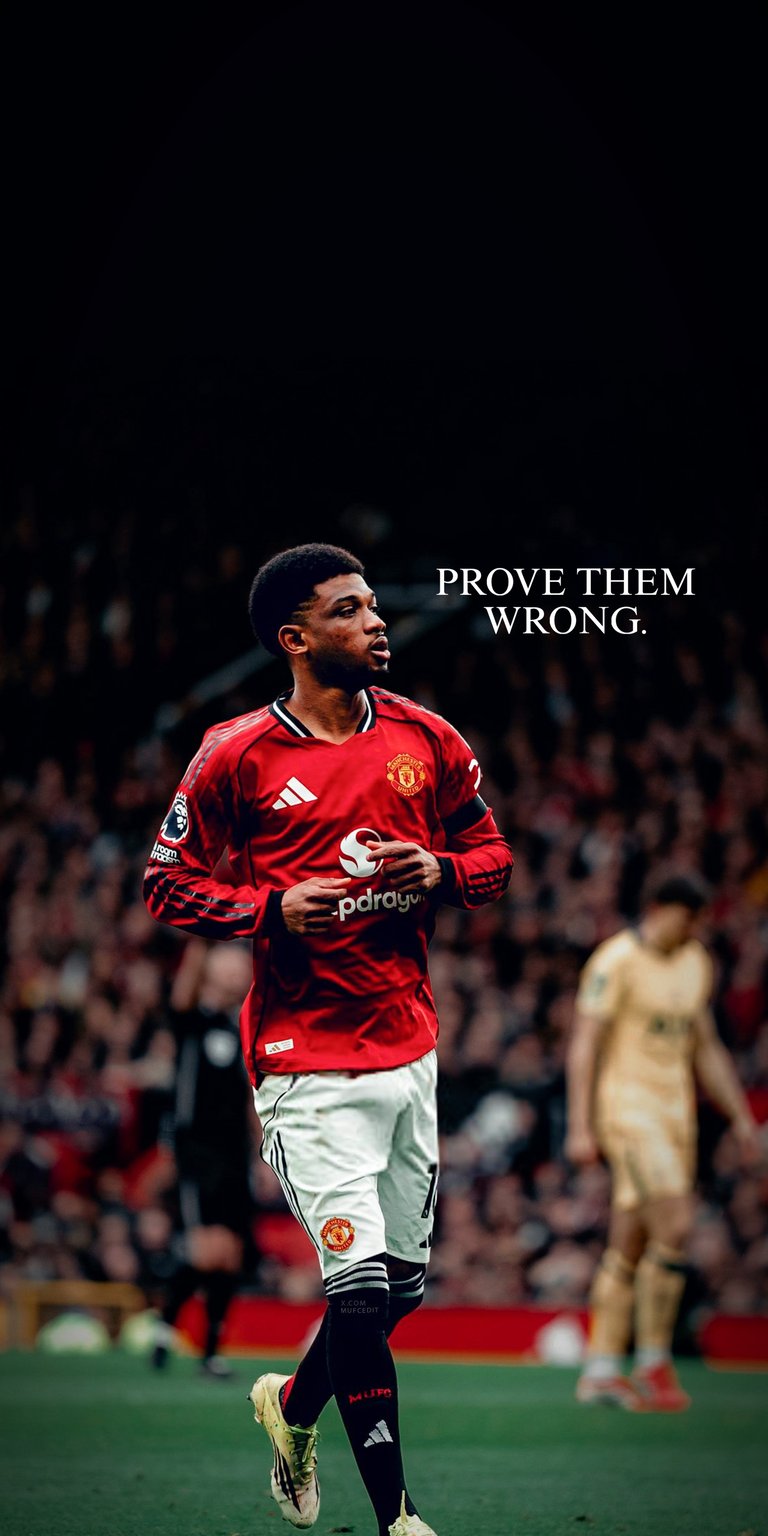 Download this Diallo 4K wallpaper for your iPhone, showcasing the Manchester United player in action. The wallpaper features Rashford wearing a long-sleeve red jersey and black socks, with the powerful words 'Prove Them Wrong' displayed.