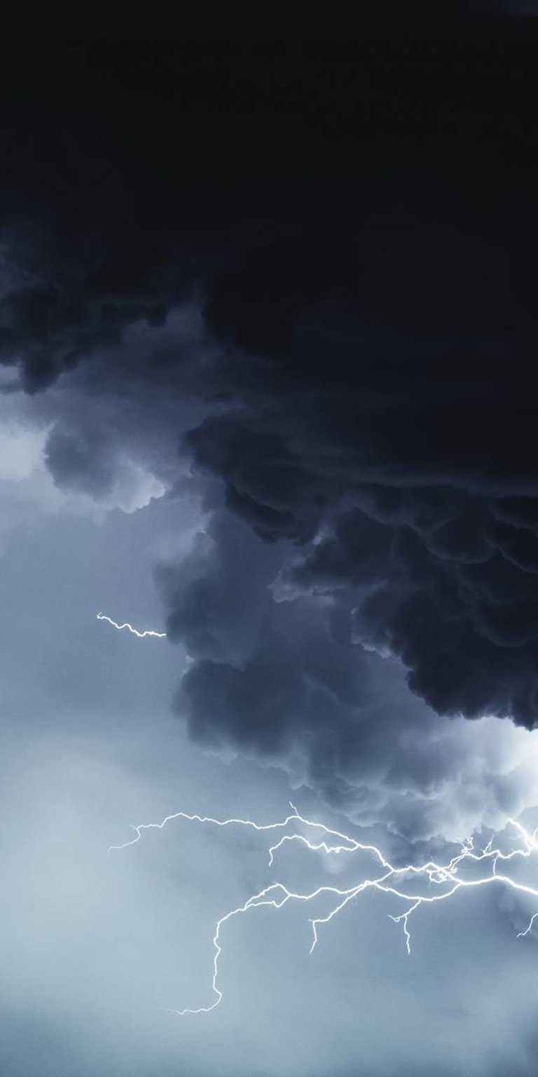 Thunderstorms hiding behind the dark clounds wallpaper