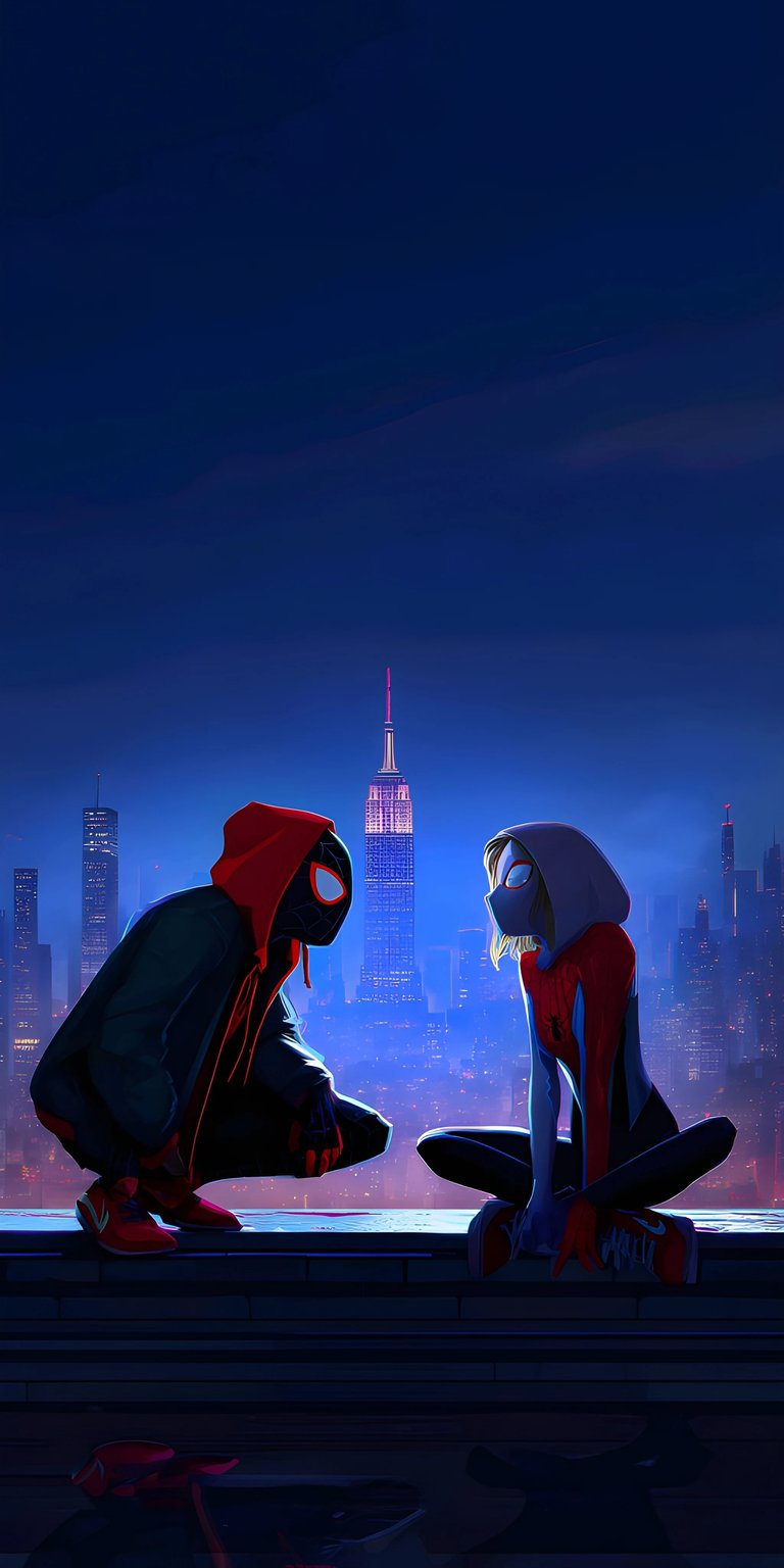 Elevate your iPhone with this incredible 4K wallpaper featuring Miles Morales and Gwen Stacy against a breathtaking cityscape. This wallpaper showcases the characters with red hoodies, intense expressions, and a stunning view of the Empire State Building.