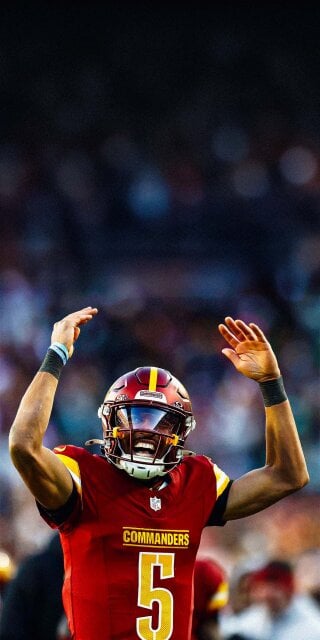 Jayden Daniels celebrates his touchdown pass Wallpaper HD iPhone