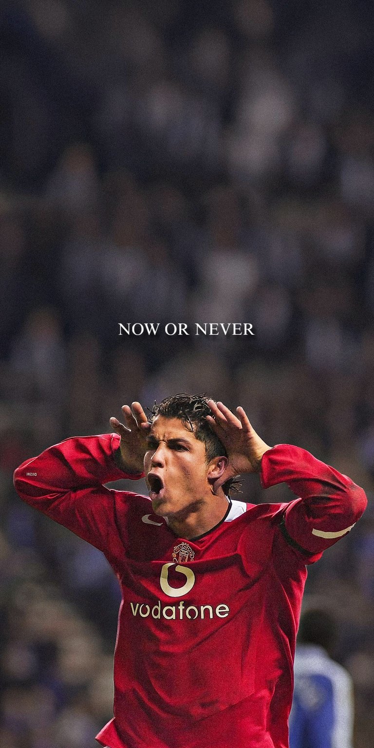 Relive the legendary "Now or Never" era of Cristiano Ronaldo during his iconic tenure at Manchester United. This live wallpaper features CR7 in the classic red Vodafone kit, capturing his intense passion and elite mentality. Perfect for football fans who want daily motivation and a tribute to one of the greatest athletes in sports history on their lock screen.