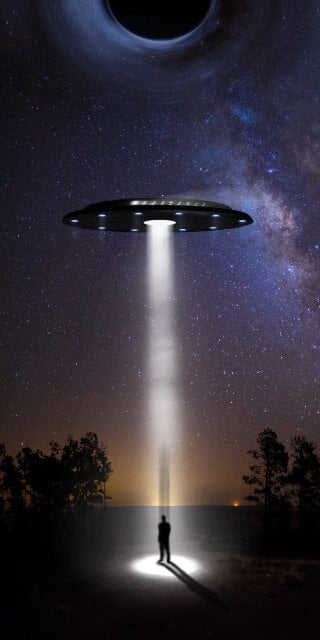 Ufo above man trying to suck him with black hole above wallpaper