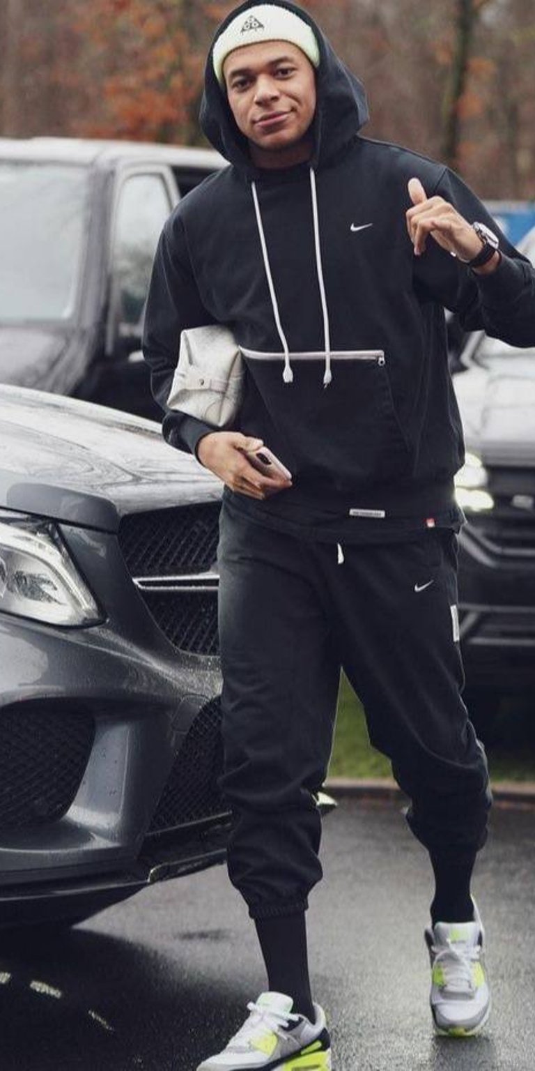 Kylian Mbappé casual on the street wallpaper for mobile