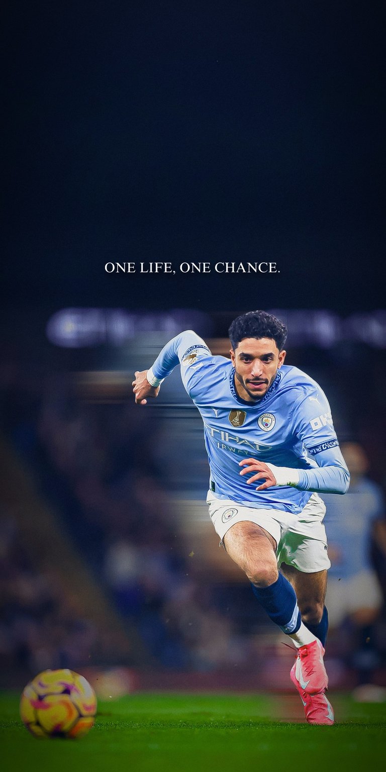 An action-packed 4K mobile wallpaper featuring Omar Marmoush in a Manchester City concept/edit. The image captures him mid-sprint with a motion blur effect that conveys speed and intensity. The heading "ONE LIFE, ONE CHANCE" sits above him, emphasizing the high stakes of professional football.