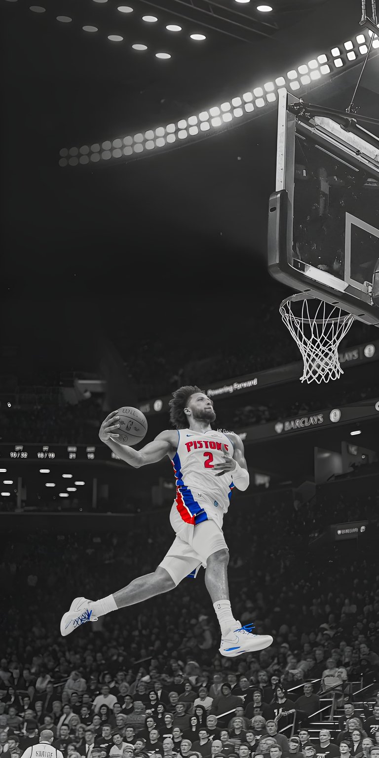 This high-action 4K wallpaper features a dynamic mid-air dunk in a stylized selective color aesthetic. Perfect for your iPhone, the background utilizes a dramatic black and white crowd contrast to make the red and blue jersey pop.