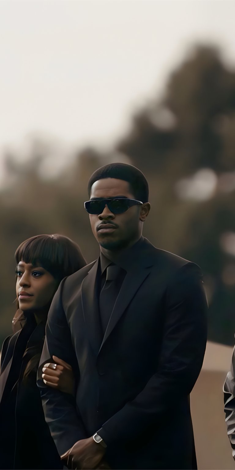 Franklin Saint and Veronique Turner together in a funeral wallpaper