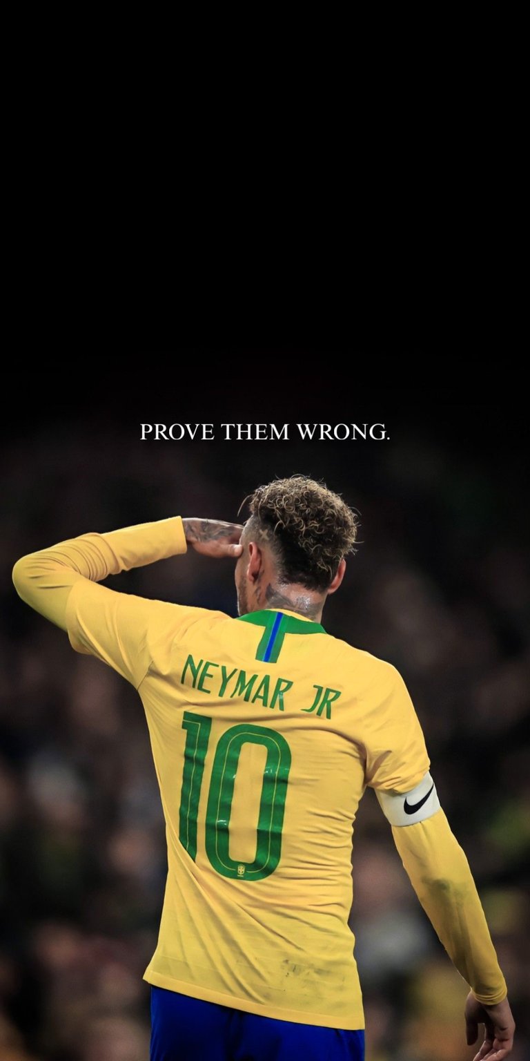 Neymar Jr wallpaper for iPhone showing a back-view salute moment in Brazil’s yellow kit against a dark stadium background. This Aesthetic wallpapers style wallpaper uses strong contrast, bold yellow and green tones, and a confident, defiant mood to stand out as a wallpaper.