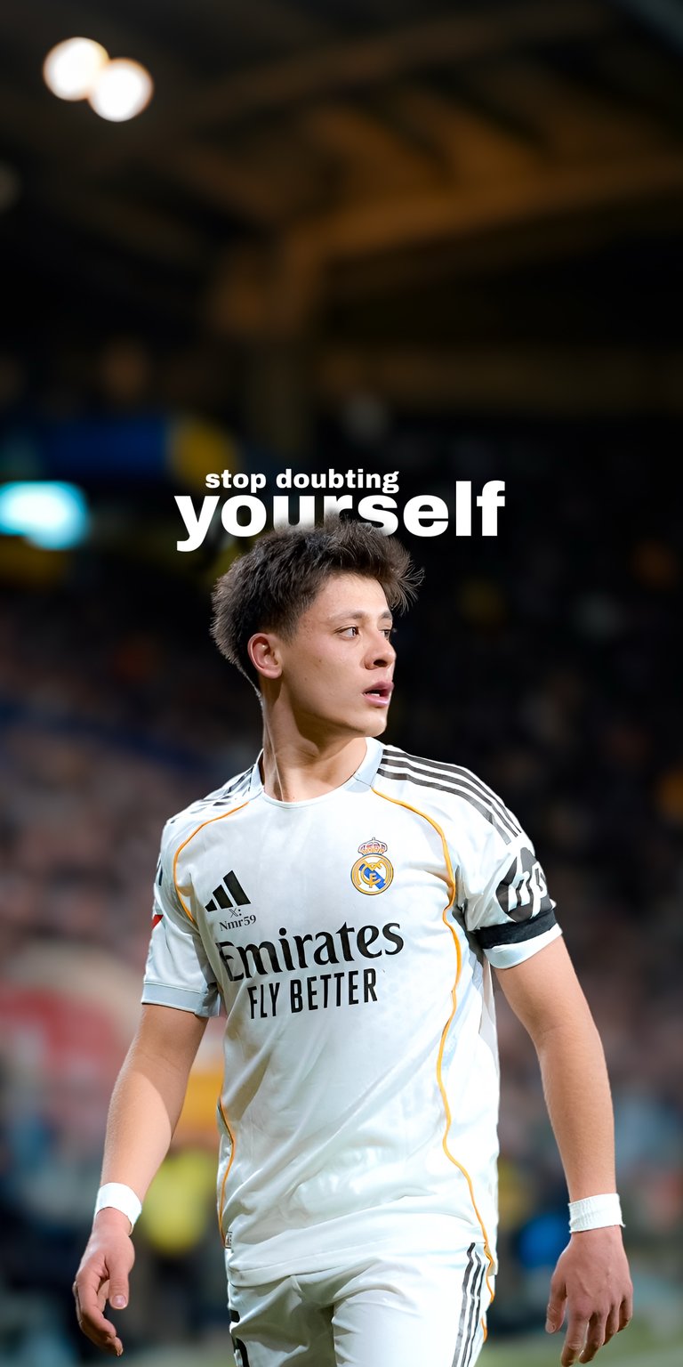 This Arda Güler Real Madrid 4K wallpaper features the young football star in a cinematic, high-contrast stadium setting for iPhone. The aesthetic wallpapers design highlights the clean white kit against a moody, blurred background with bold motivational typography.