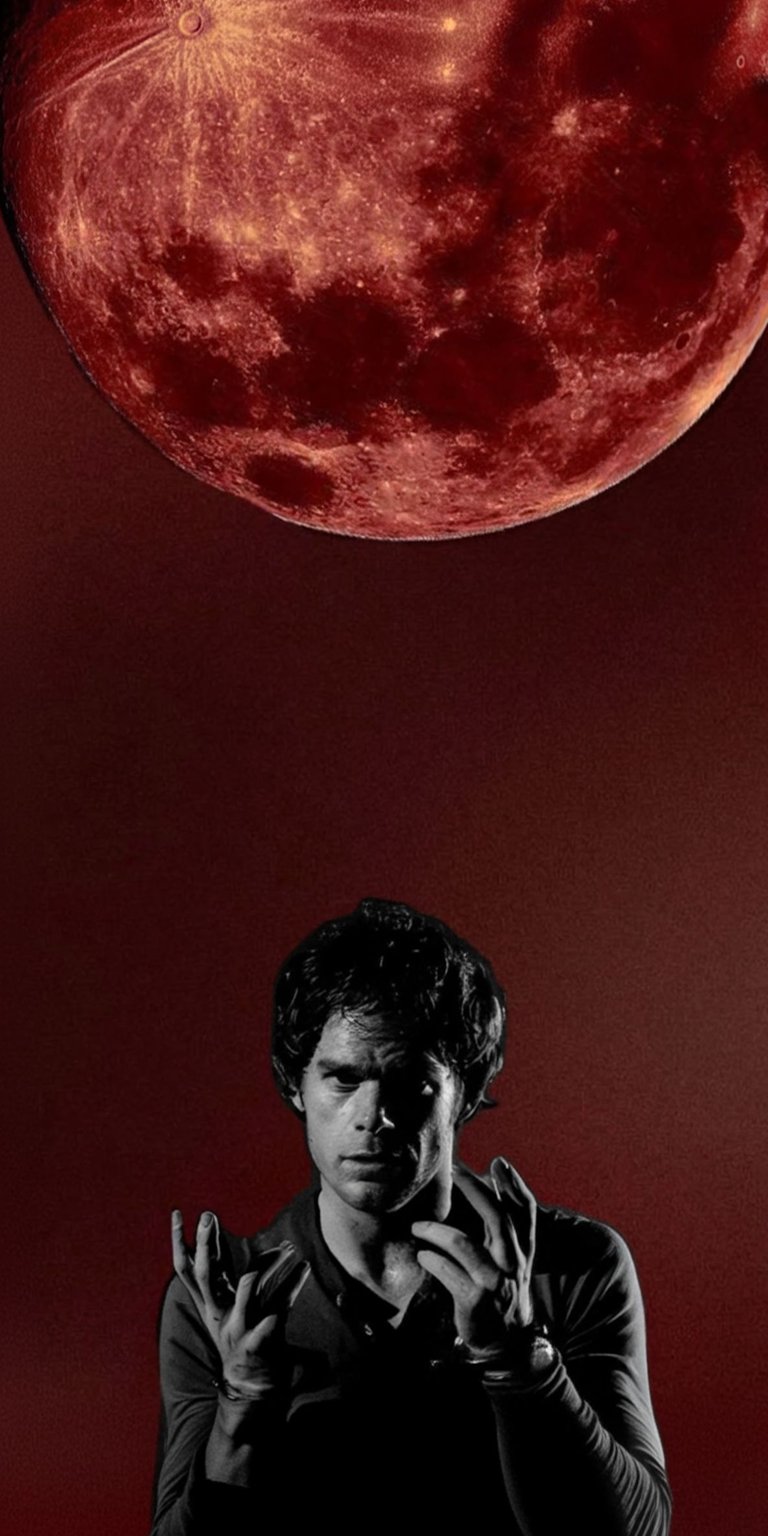 Get this Dexter 4K wallpaper for your iPhone, showcasing a red moon overhead. This wallpaper features a monochrome Dexter with his hands raised, set against a matching red background.