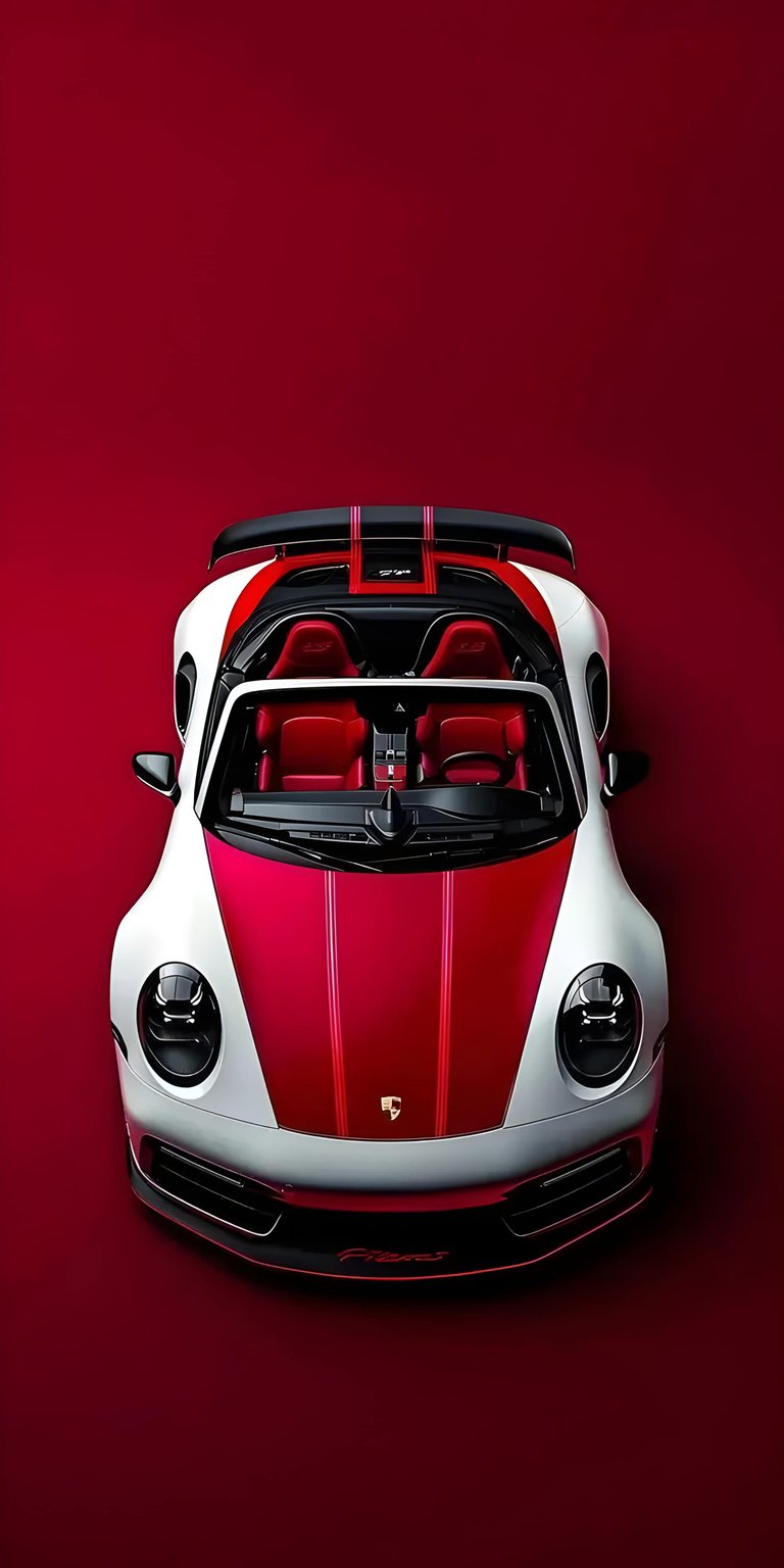Get this sleek Porsche 4K wallpaper for your iPhone, showcasing its striking red interior and racing stripe. This wallpaper highlights the car's aerodynamic spoiler and low-profile stance.