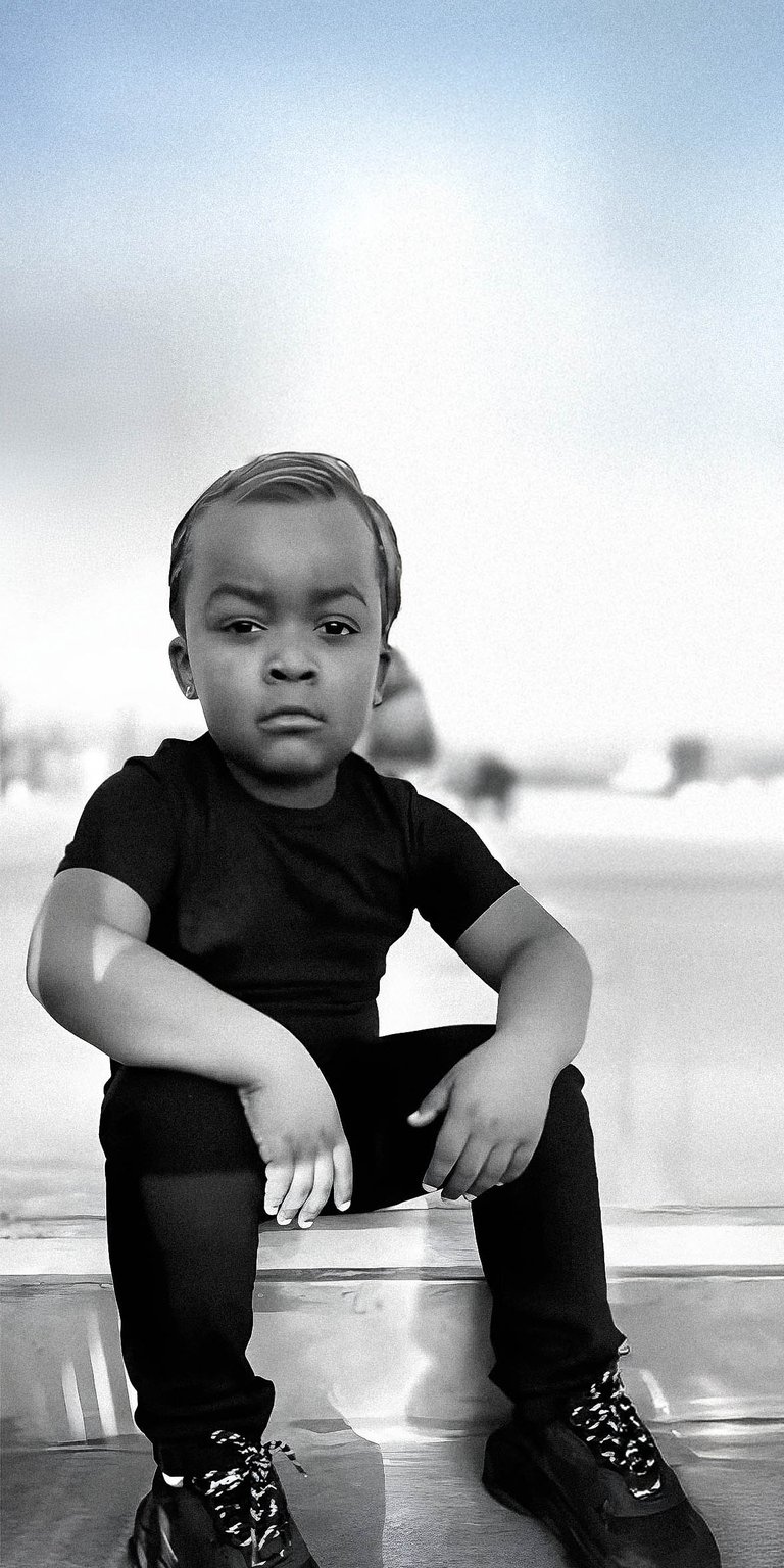 Little kid serious pose phone wallpaper