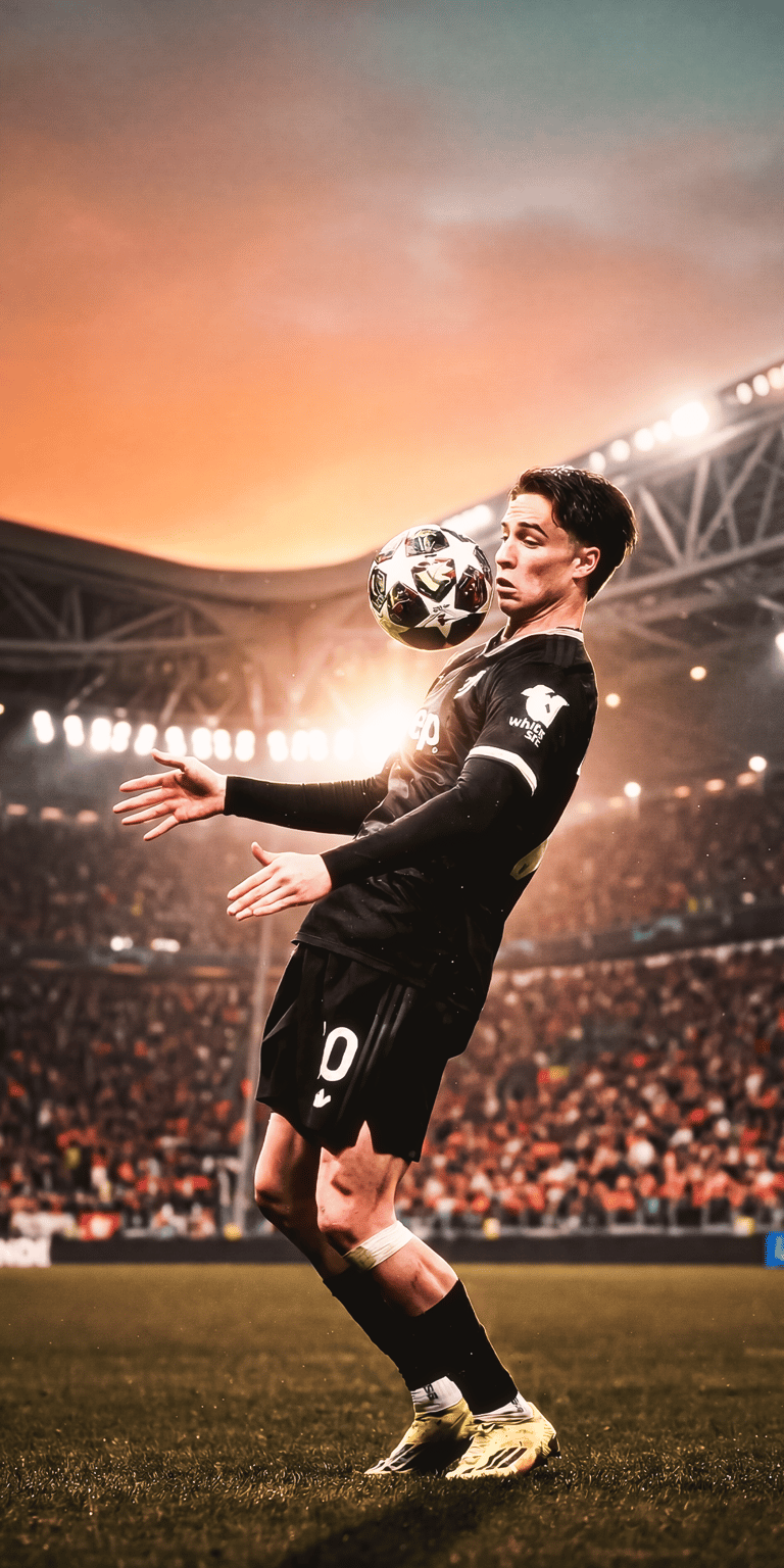 An aesthetic wallpaper featuring Dominik Szoboszlai in a black kit controlling a football mid-air. This 3D wallpaper captures the athlete's precision against a warm, atmospheric stadium glow for your iPhone.