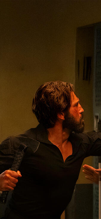 Punisher fighting scene matching wallpaper for iPhone