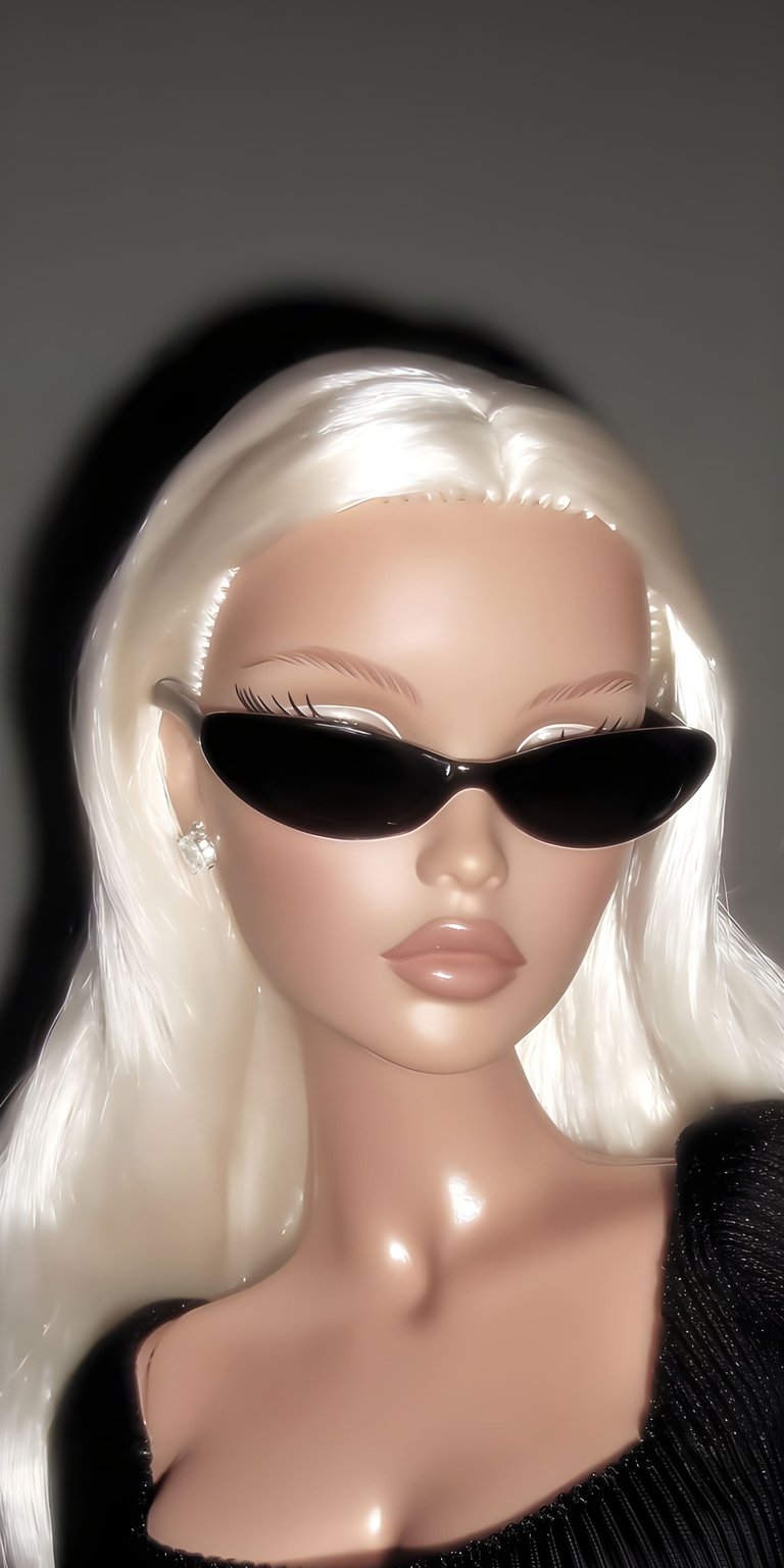 Poppy Parker aesthetic wallpapers showcased as a glossy portrait wallpaper designed for iPhone. This wallpaper features soft neutral tones, studio lighting highlights, and a sleek fashion-forward mood for a polished wallpaper look.