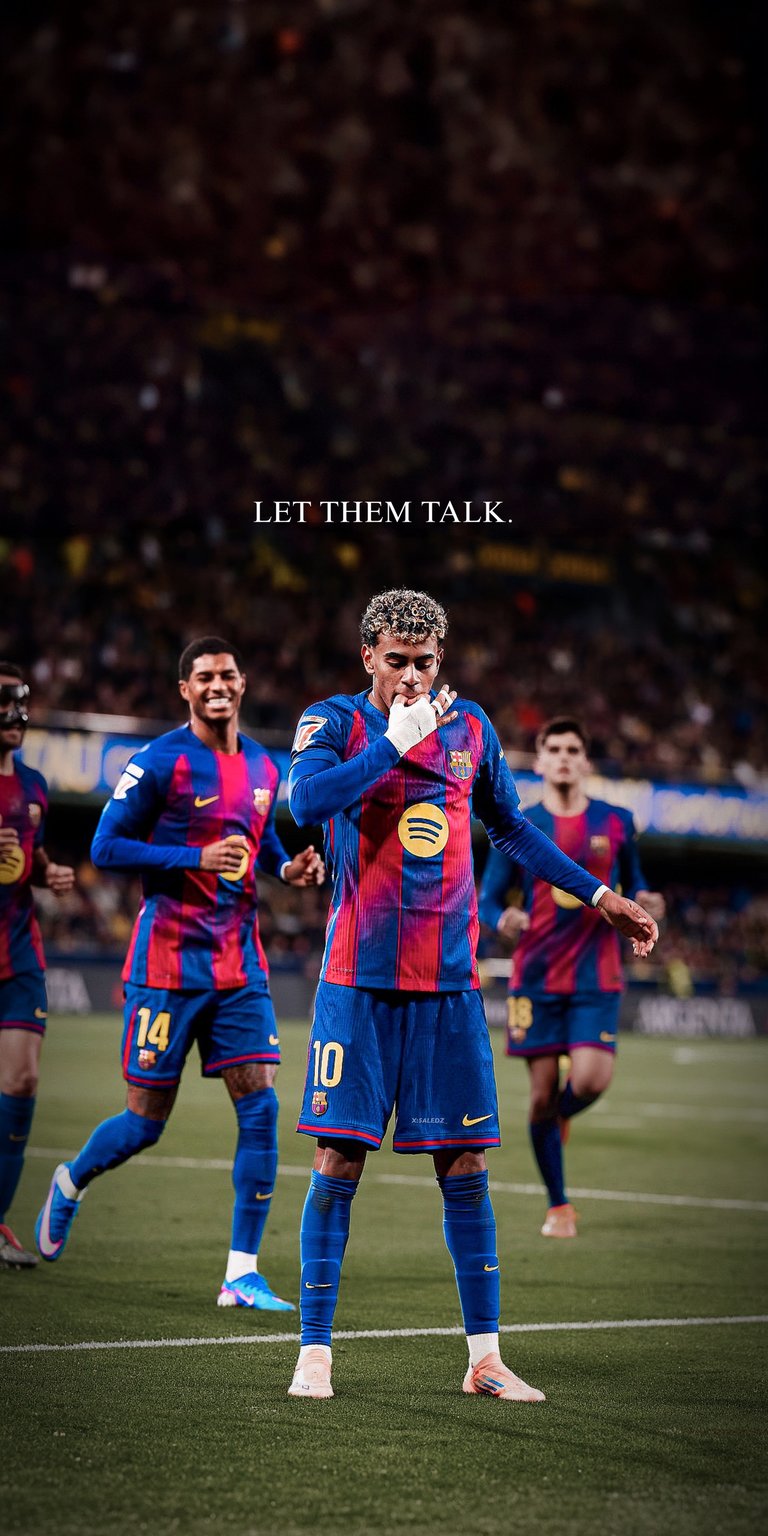 This vibrant wallpaper showcases FC Barcelona’s rising star Lamine Yamal alongside teammate Raphinha. Lamine is seen in a focused pose with his fingers to his ears, embodying the "LET THEM TALK" quote displayed above. Featuring the classic Blaugrana colors, this shot captures the youthful energy and resilience of the modern Barca squad.