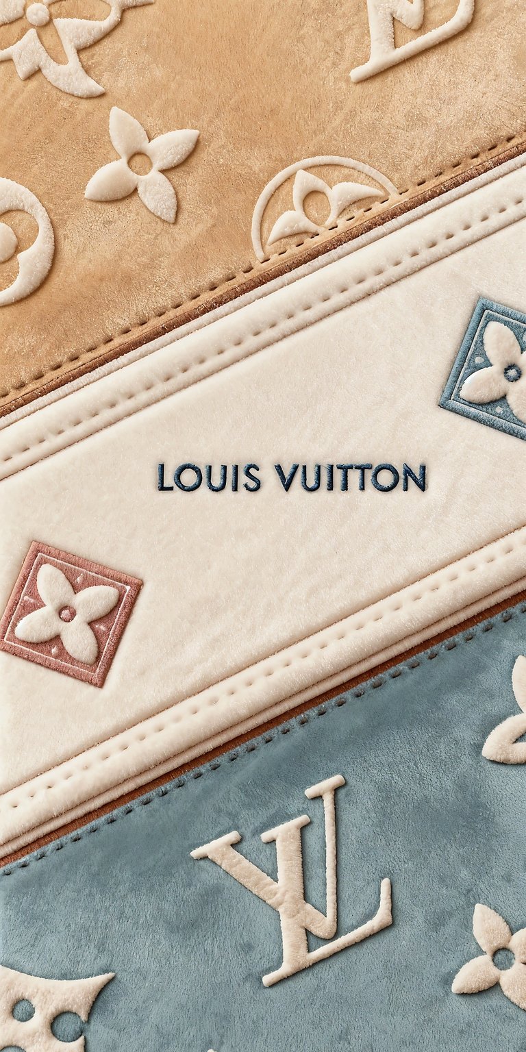 Louis Vuitton 4K wallpaper showcasing a detailed monogram pattern in soft beige and blue tones. This aesthetic wallpaper features embossed textures and luxury branding, ideal for an elegant iPhone lock screen or home screen.