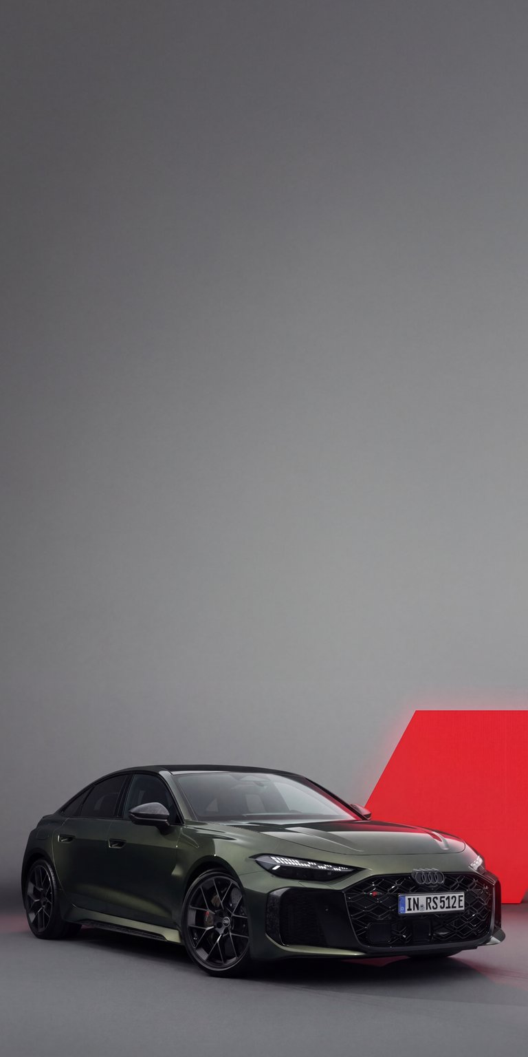 A sophisticated dark green Audi RS5 sits against a clean grey and red background. This 4K wallpaper offers a unique color palette for a premium iPhone aesthetic wallpaper.