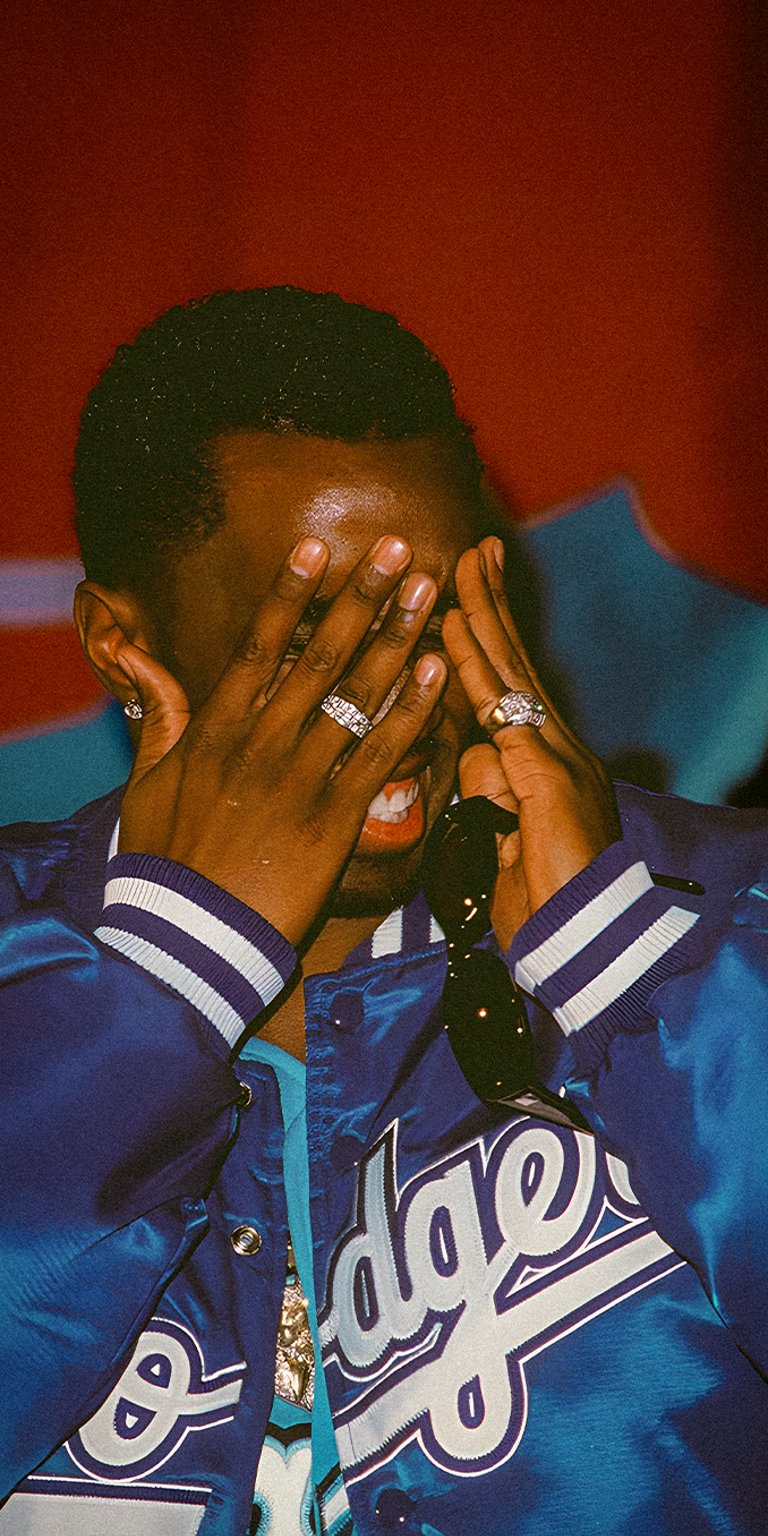 P Diddy covering his eyes wallpaper