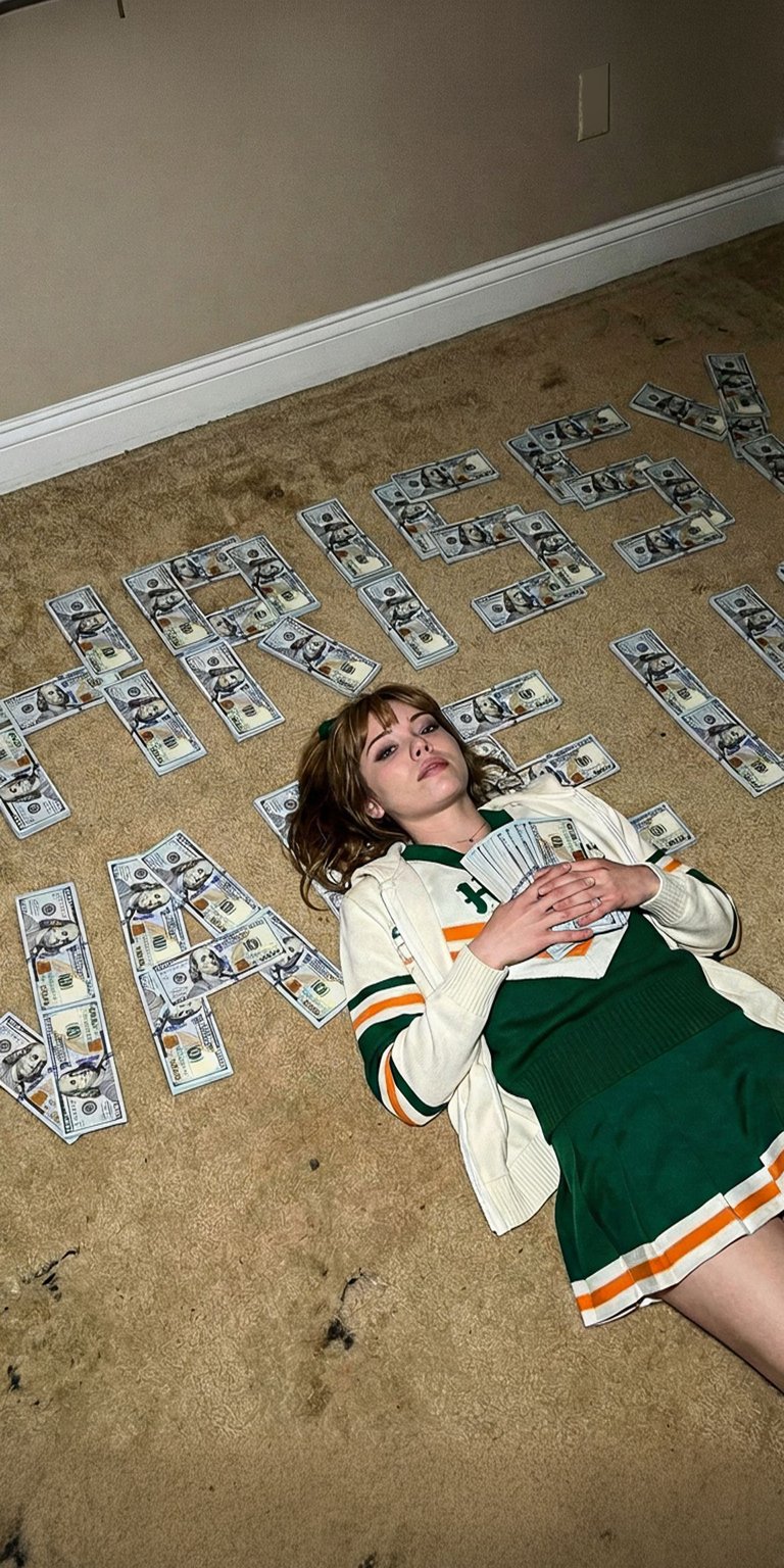 Download this Maisie Peters 4K wallpaper for your iPhone, showcasing the singer in a green and orange cheerleader outfit. The wallpaper highlights her lying on the floor surrounded by hundreds of dollars spelling out her name.