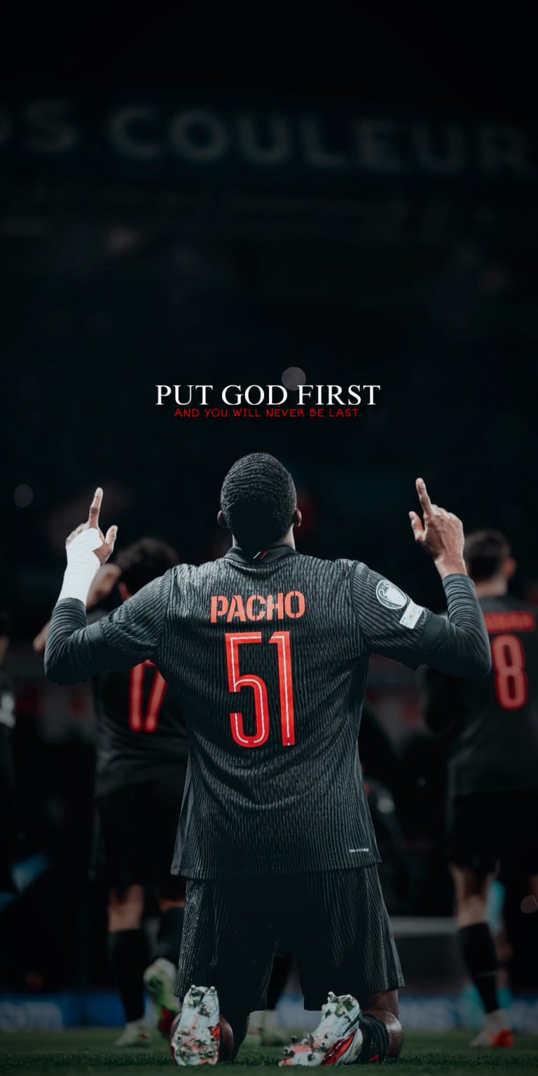 A deeply spiritual and motivational 4K wallpaper featuring the Paris Saint-Germain (PSG) player Pacho (jersey number 51) kneeling in reflection after a goal. The powerful and uplifting phrase "PUT GOD FIRST" is overlaid, emphasizing faith and commitment. This striking image, viewed from behind, is perfect for those seeking a high-definition, faith-based sports aesthetic. Inspire your day with this powerful display of devotion and sport!