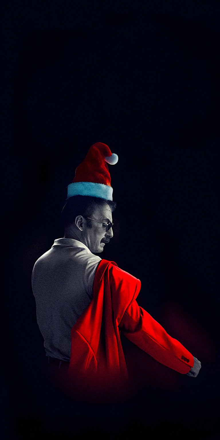 Saul wearing christmas hat
