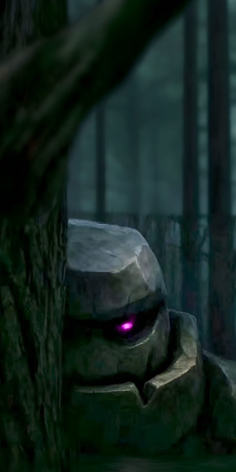 Download this Stone Golem 4K wallpaper for your iPhone and marvel at its glowing purple eye. This stunning wallpaper features a glimpse of the golem amidst the forest, partially obscured by a large tree.
