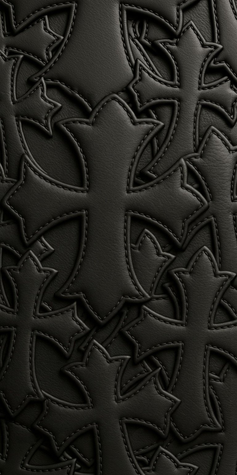 This 4K wallpaper features a sophisticated dark aesthetic with layered black leather Gothic crosses and detailed stitching. Designed for the iPhone, this high-contrast background offers a premium tactile look for your home screen or lock screen.