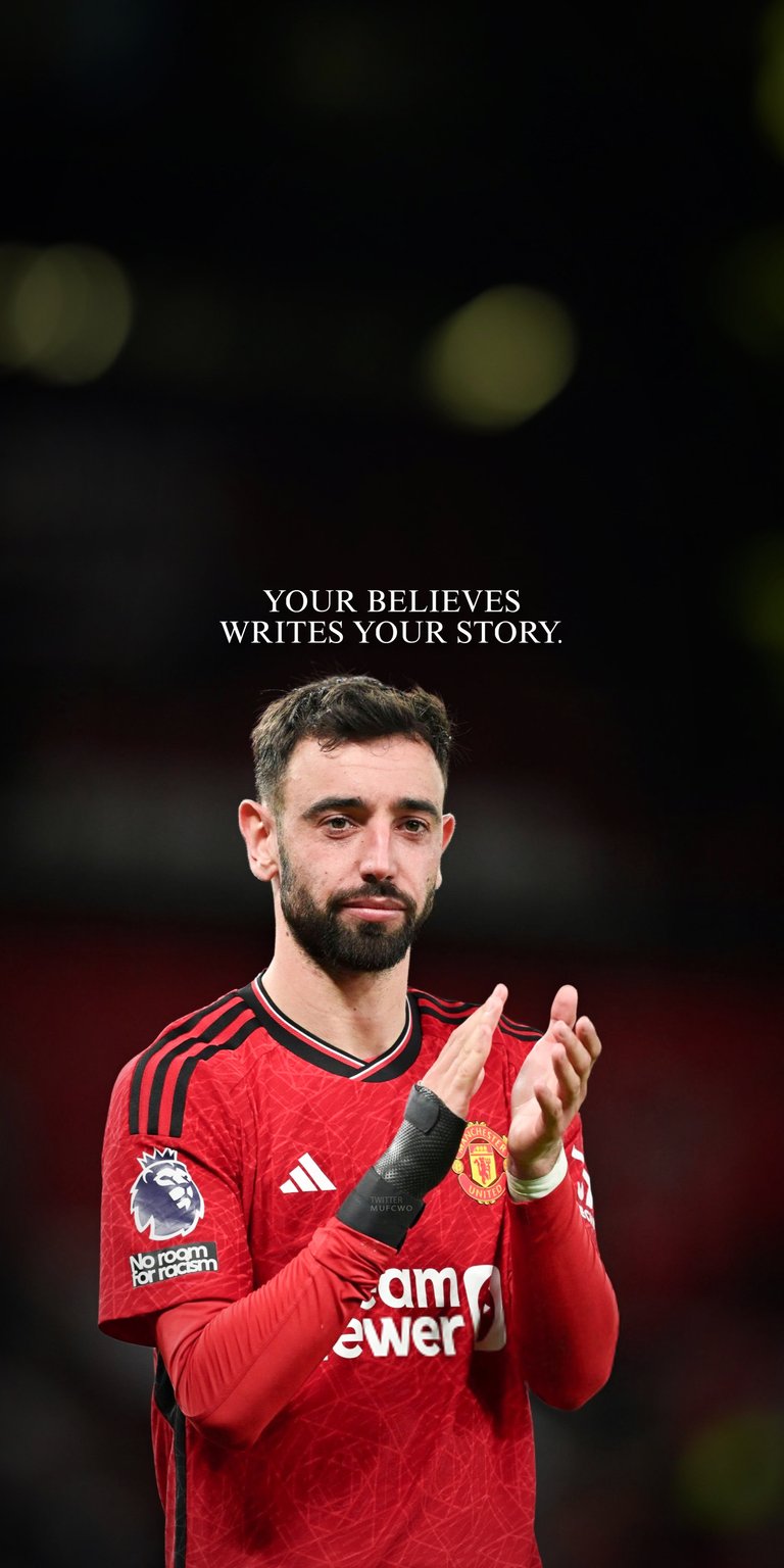 This Bruno Fernandes 4K wallpaper features the Manchester United captain in a cinematic red home kit against a dark, blurred stadium backdrop. Designed specifically for iPhone, this aesthetic wallpaper captures an inspiring moment of the midfielder with high-contrast lighting and a motivational quote.