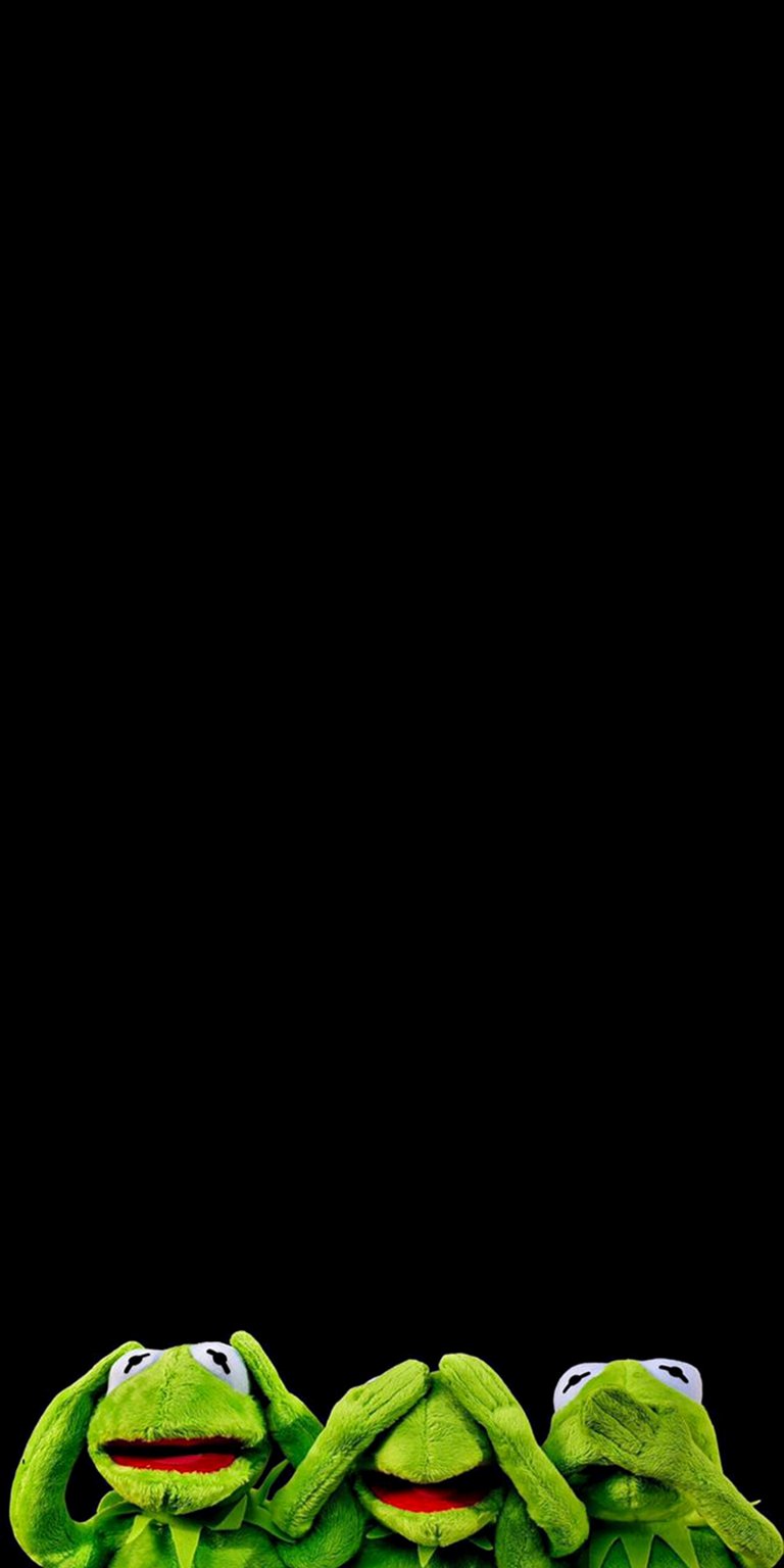 This 4K wallpaper features three Kermit the Frog plushies, one covering its ears, another its eyes, and the last its mouth, against a stark black backdrop, perfect for your iPhone. Download this unique Kermit wallpaper and bring a touch of humor to your device.