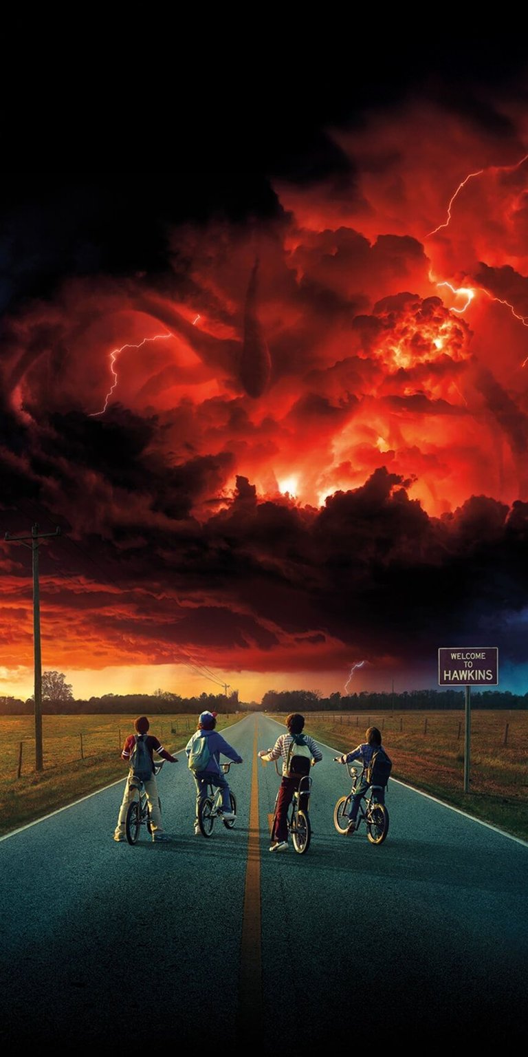 Download this Stranger Things 4K wallpaper for your iPhone, showcasing the iconic bike scene. The 4K wallpaper features the ominous, blood-red sky and the ominous, tentacle-like shadow.