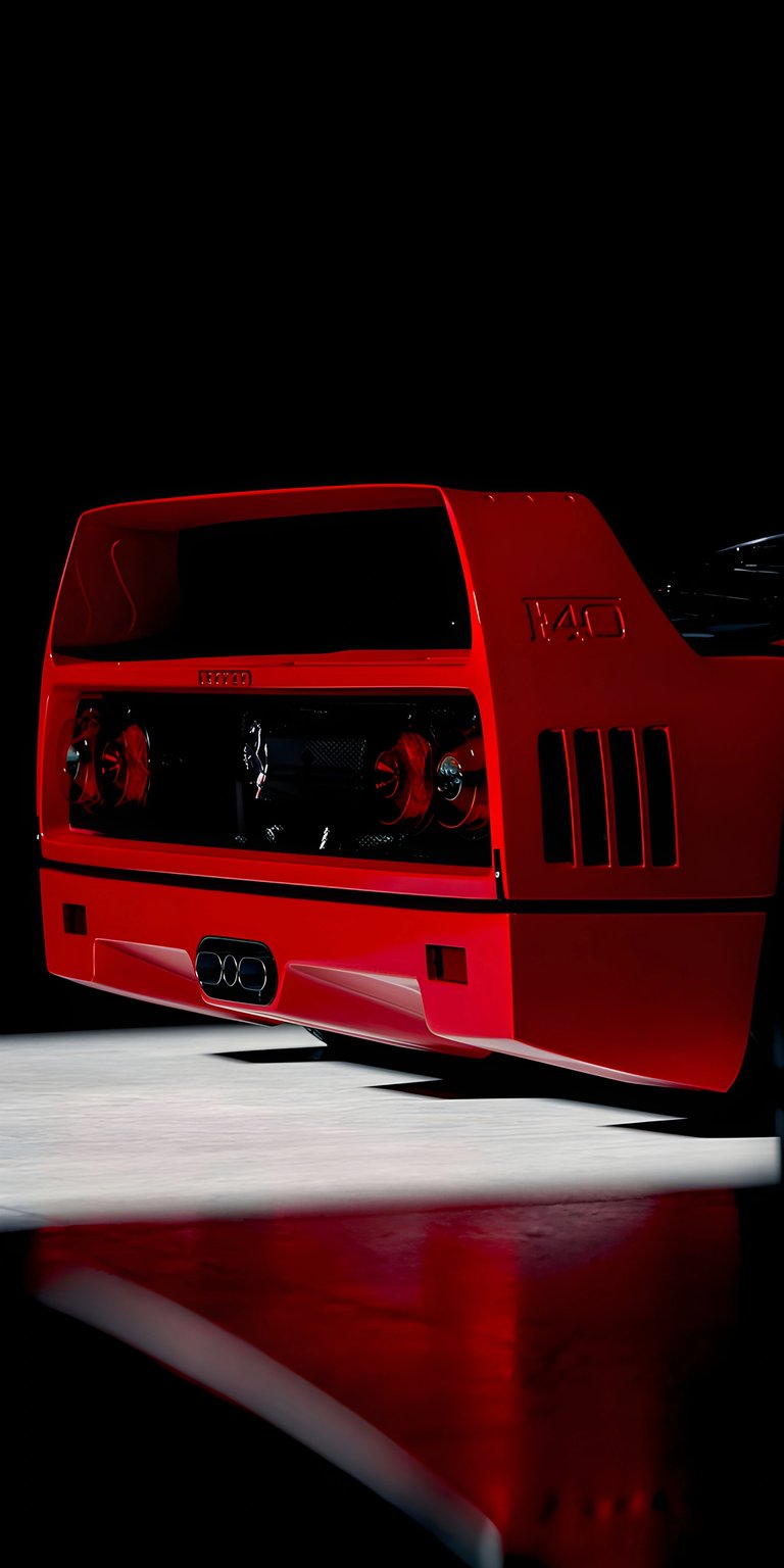 Get this Ferrari F40 4K wallpaper for your iPhone, showcasing the car's iconic rear design. This wallpaper highlights the bright red paint, triple exhaust pipes, and prominent spoiler.