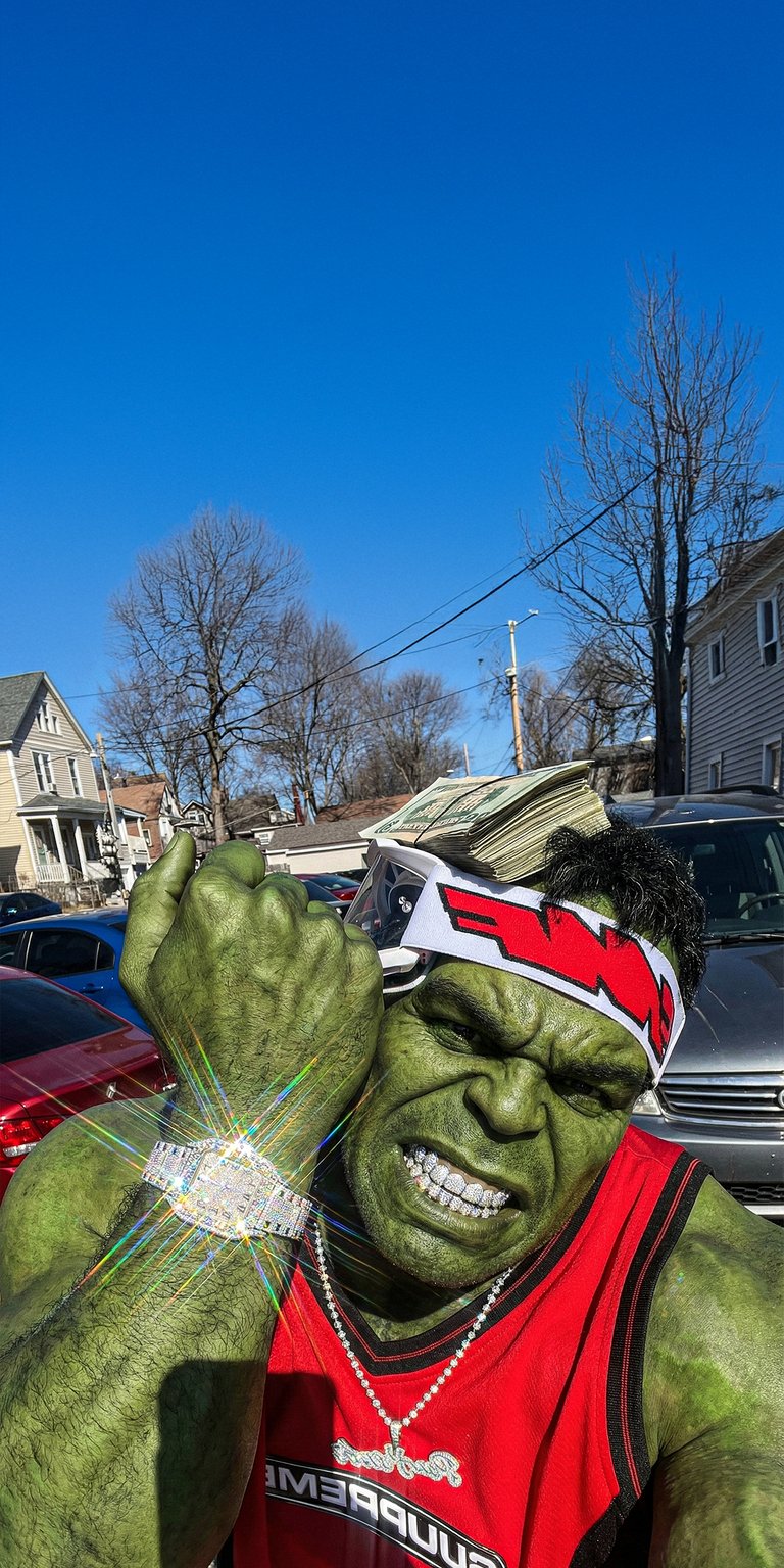 This 4K aesthetic wallpaper features the Hulk flexing with a stack of money, diamond grillz, and an iced-out watch. Perfect for your iPhone, this wallpaper captures a vibrant outdoor scene with bright sunlight and sparkling rainbow lens flares.